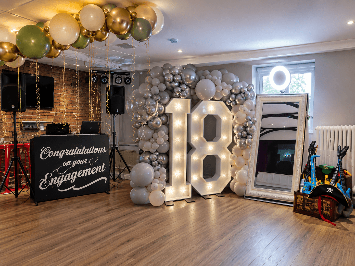 DJ booth, Magic Mirror and illuminated LED numbers at a celebration