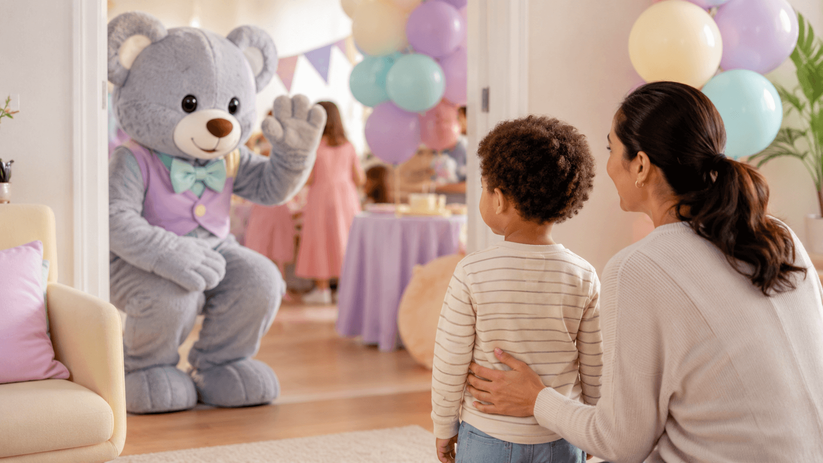 Child being gradually introduced to a friendly party character with a parent nearby
