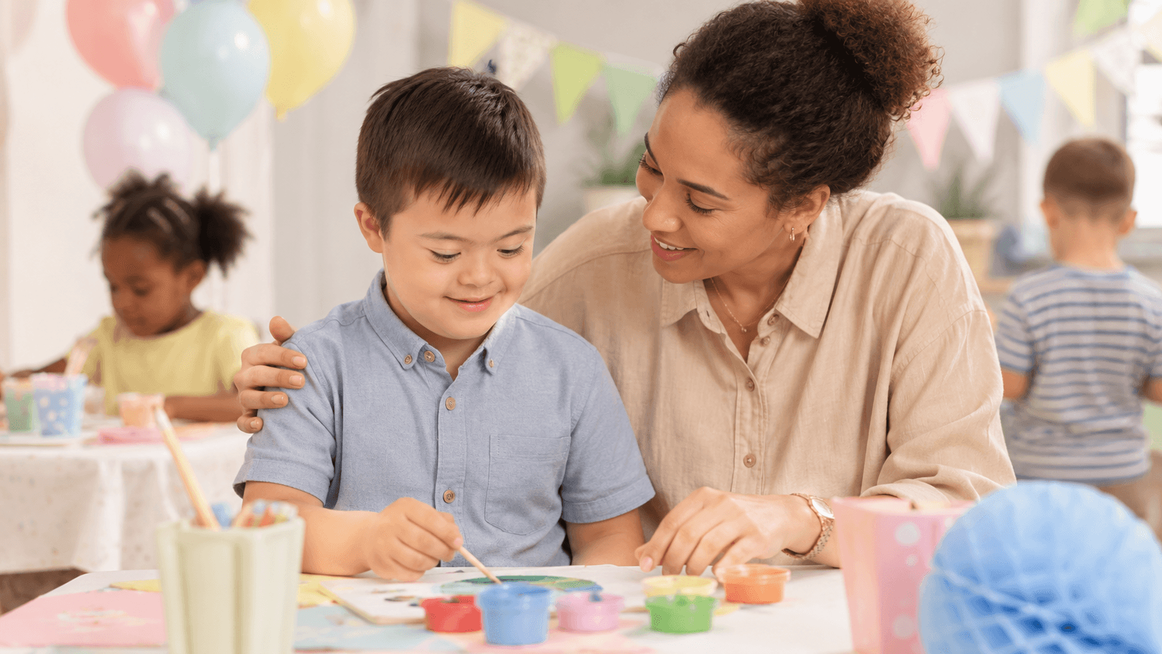 Parent and child enjoying an inclusive party activity together