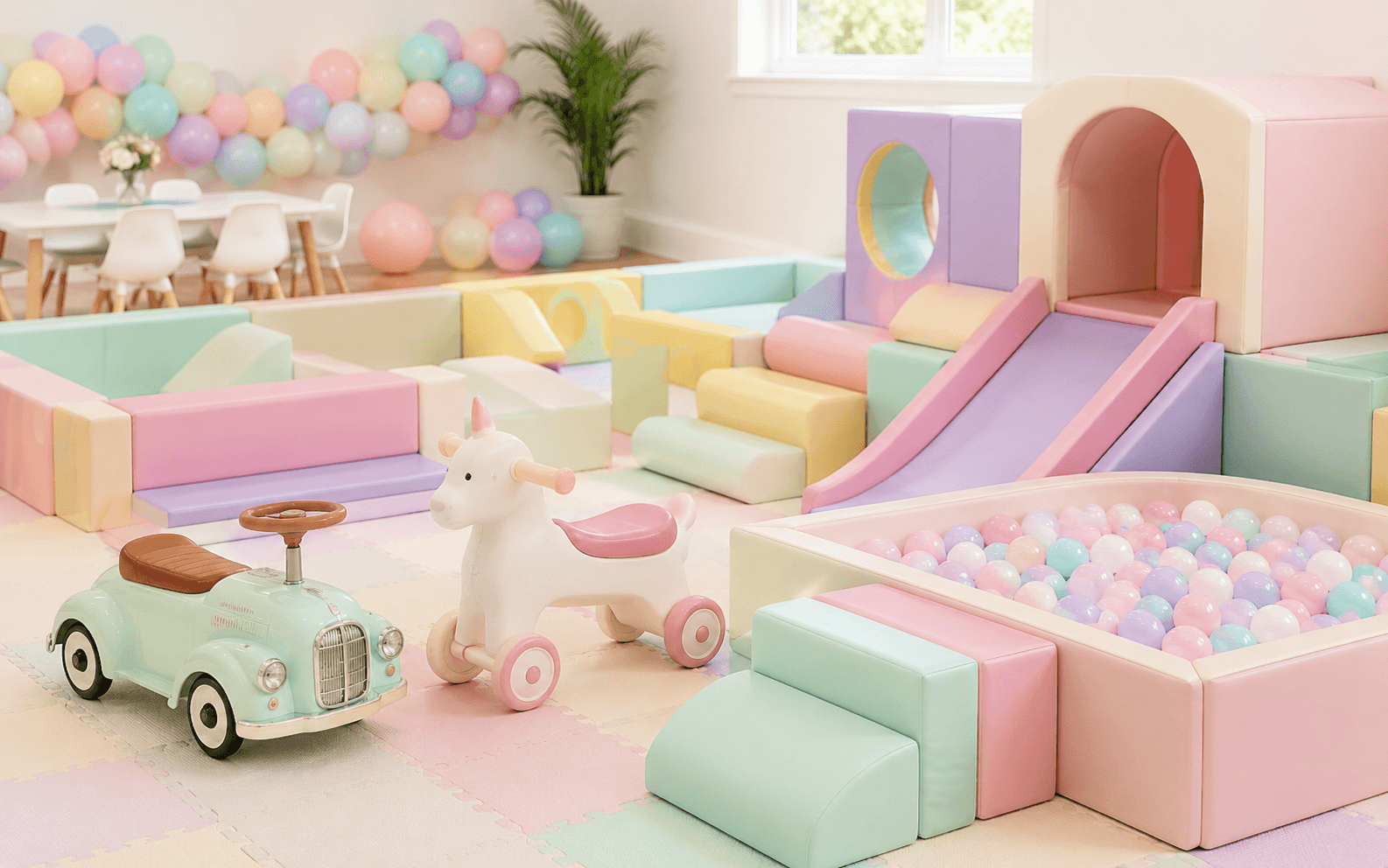 Soft play, ball pit and ride-on equipment for a children's party