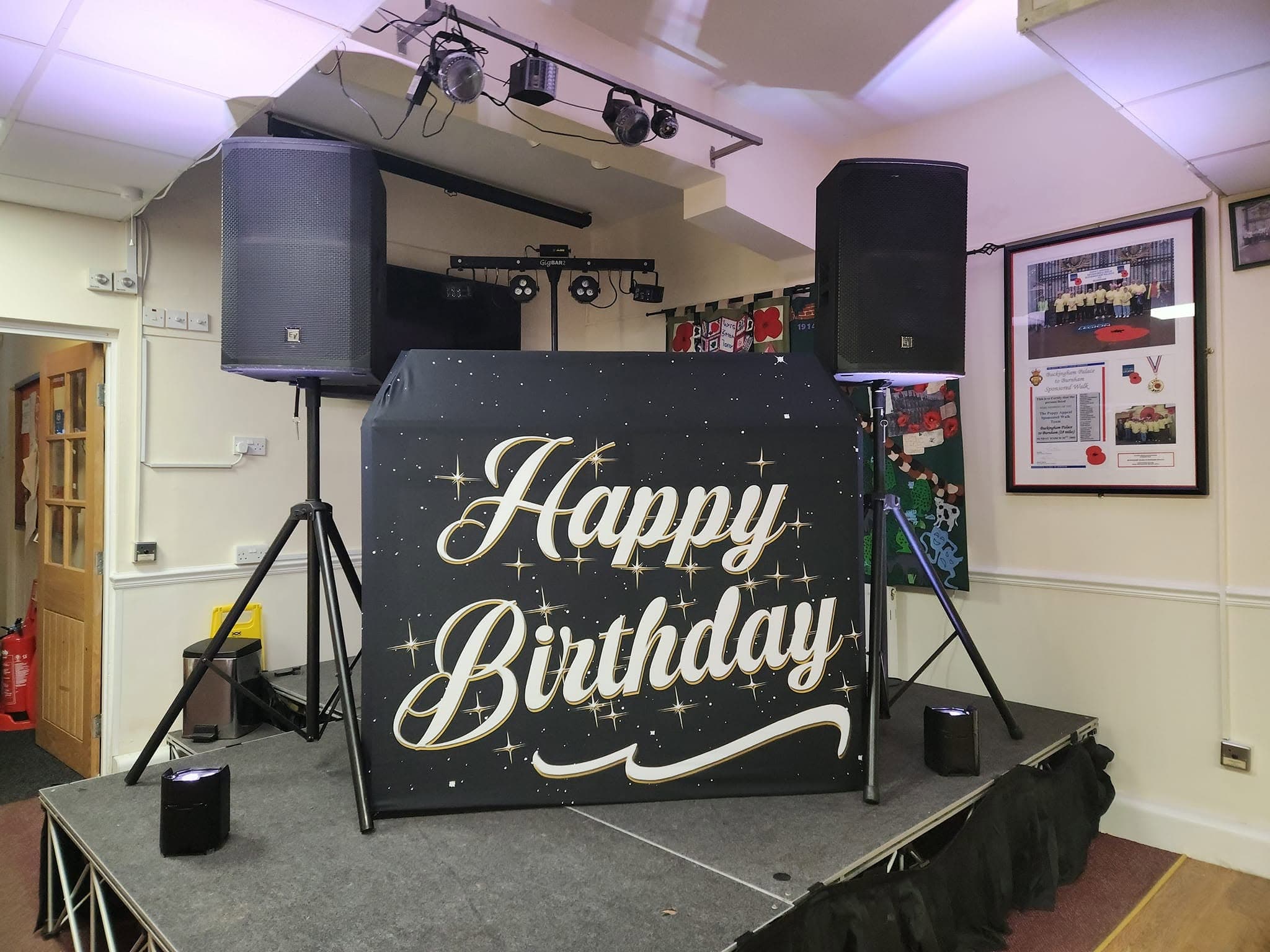 Professional DJ booth and speaker setup for a celebration